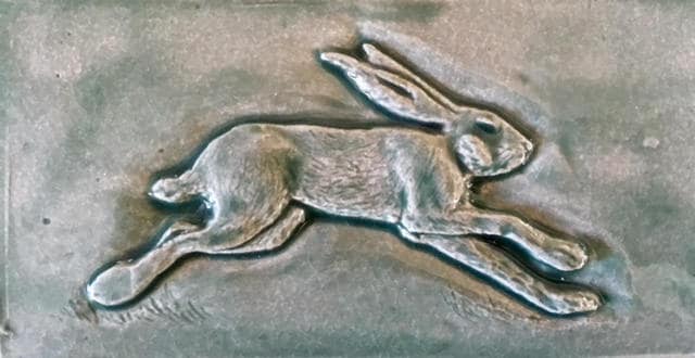Set of three Running Hare Subway feature tiles in a soft Green /Grey Glaze