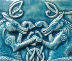 Handmade Backsplash Celtic Seahorse bas relief tile in crackle blue glaze. 12"x12"