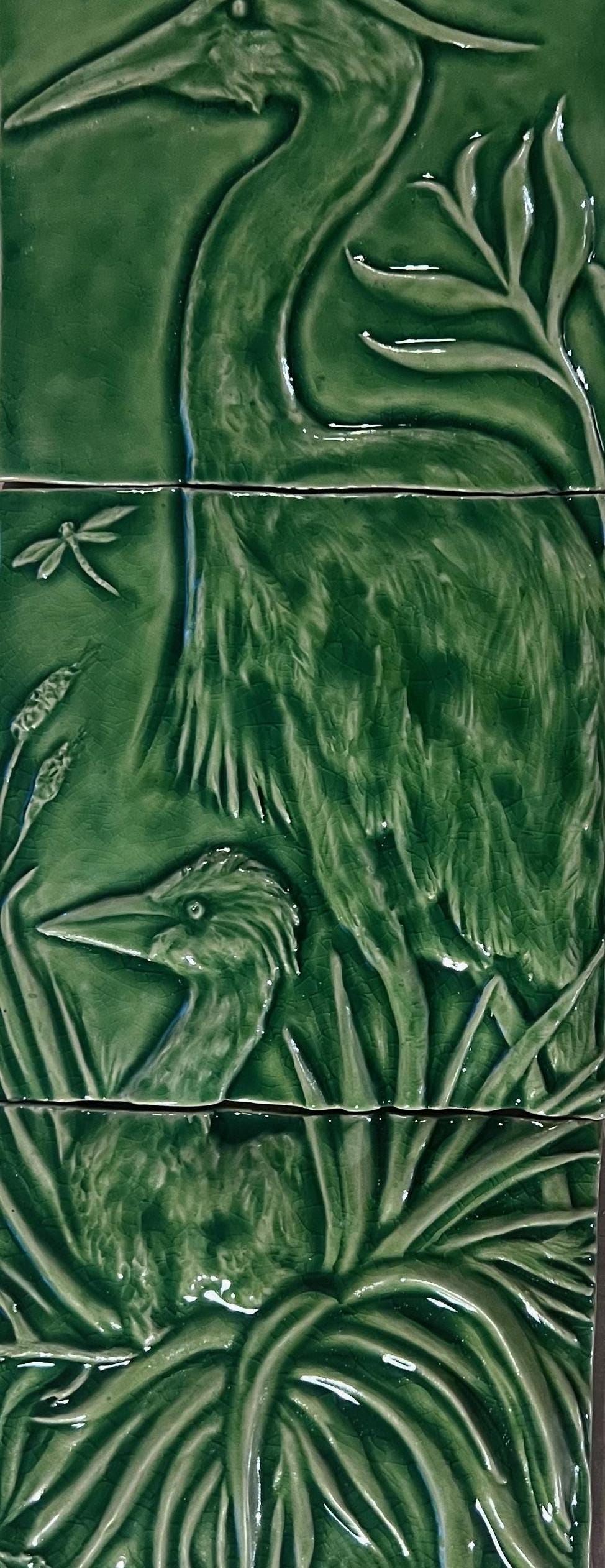 Ceramic Elegant mother Heron with baby chick 8″ x 24″ in crackle green  glaze.