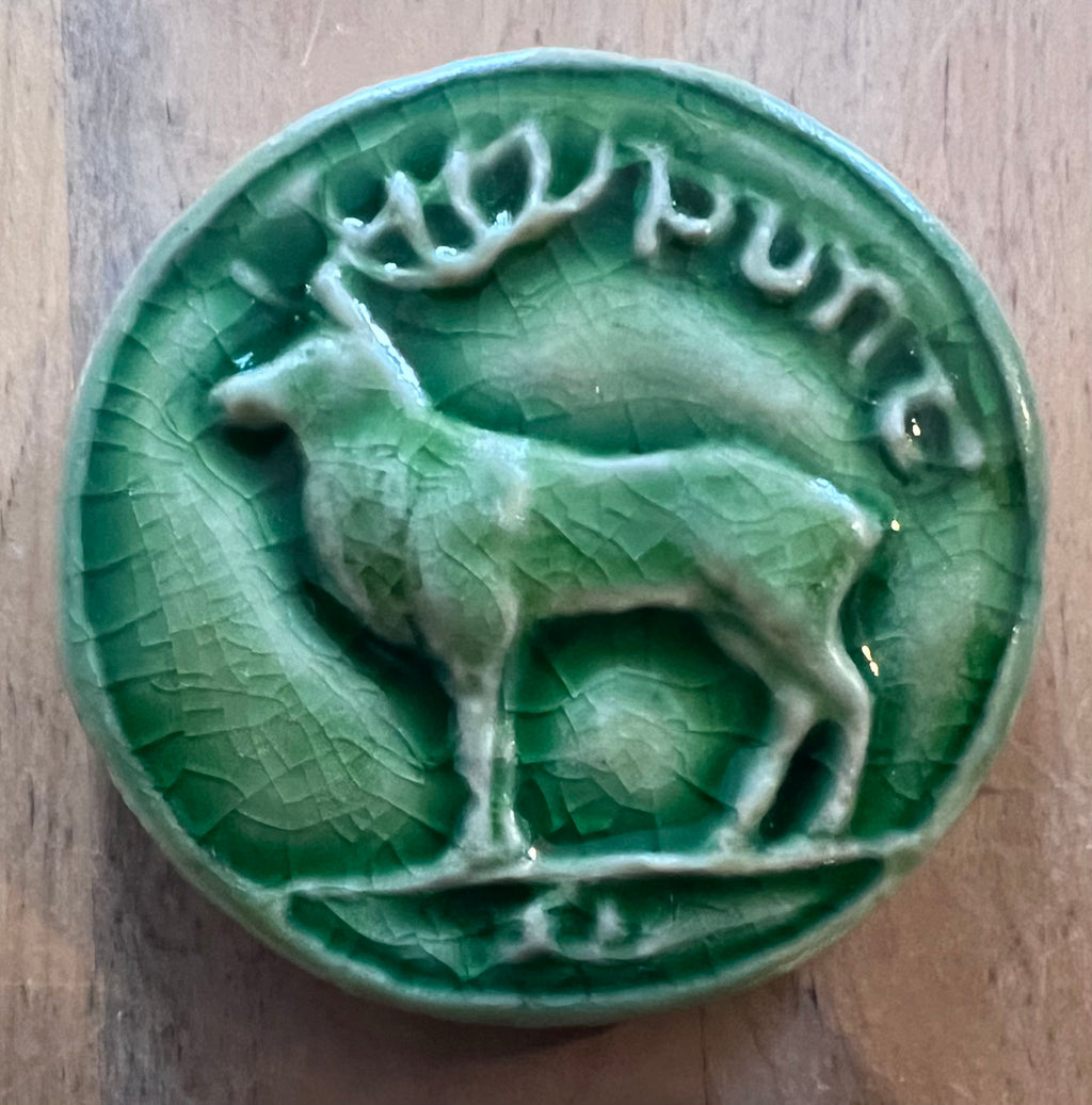 Round ceramic bas-relief  Tile deer inspired by the old Irish coin collection.