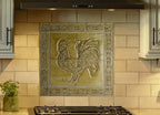 Ceramic bas relief cockerel backsplash in wheat glaze and celtic knot border.