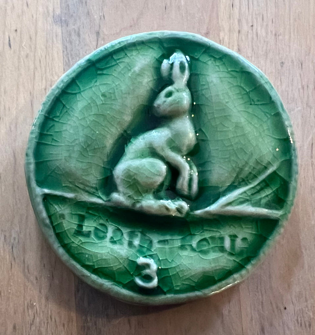 Round ceramic bas-relief  Irish hare tile  inspired by the old Irish coin collection.