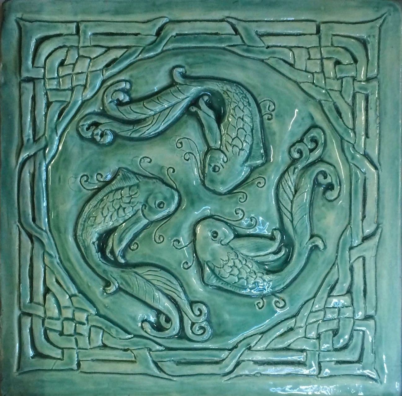 Celtic 'fish of Knowledge' Ceramic bas relief  Tile in turquoise glaze,