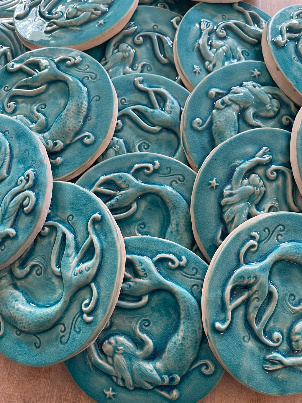 Round 6" Mermaid tile In a crackle blue glaze