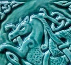 Handmade Celtic Seahorse ceramic bas relief tile in Turquoise  glaze. 6'X6' Left facing