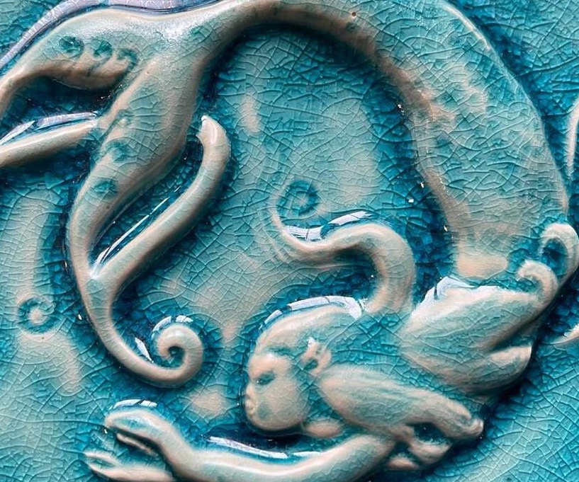 Round 6" Mermaid tile In a crackle blue glaze