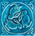 6"Crackle blue Celtic bunnies ceramic tile in stoneware clay .