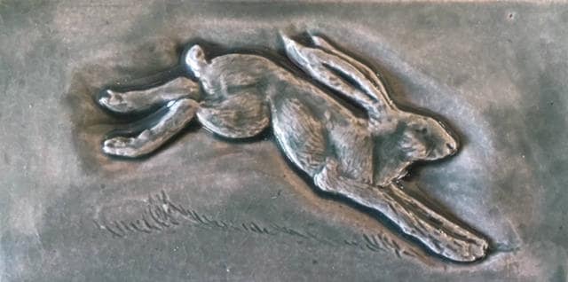 Set of three Running Hare Subway feature tiles in a soft Green /Grey Glaze