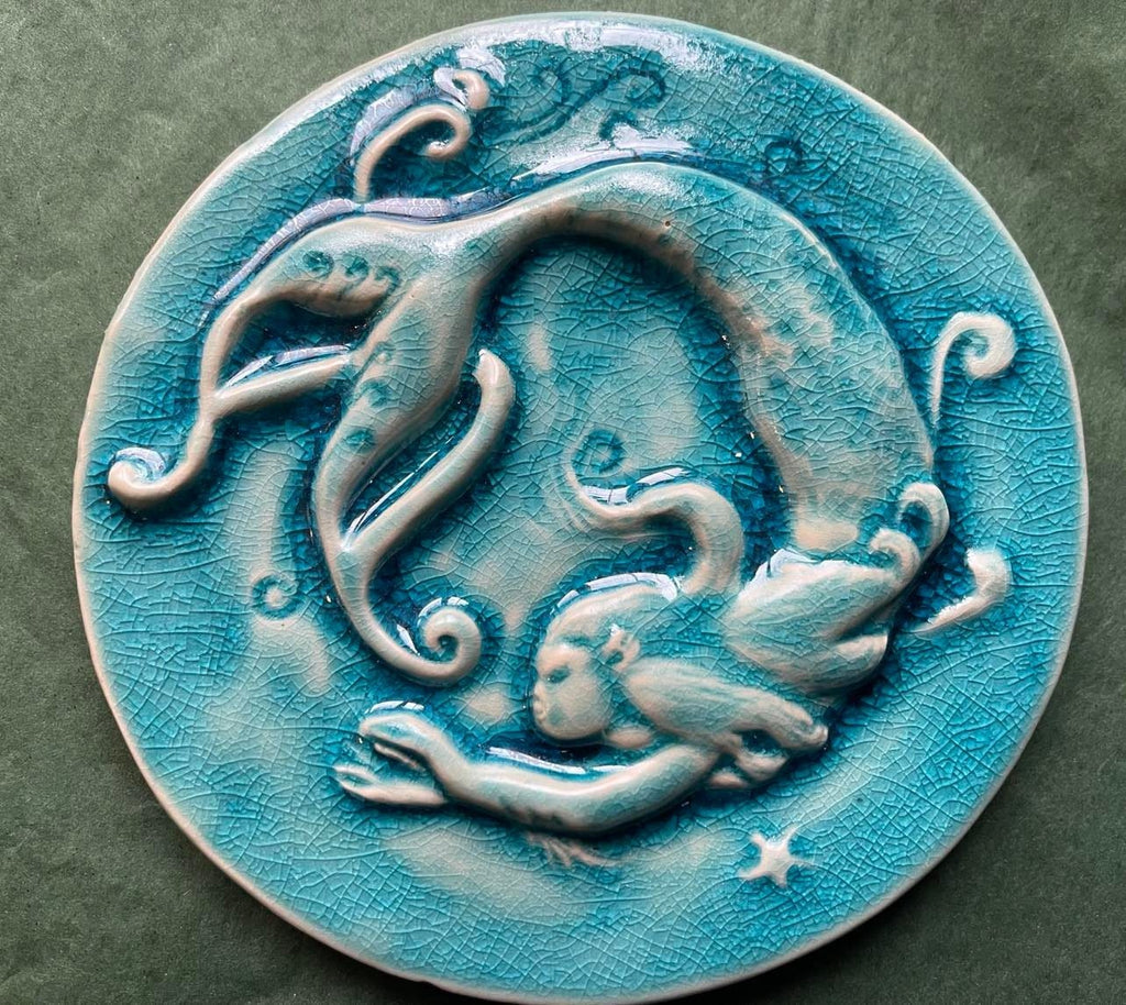 Round 6" Mermaid tile In a crackle blue glaze
